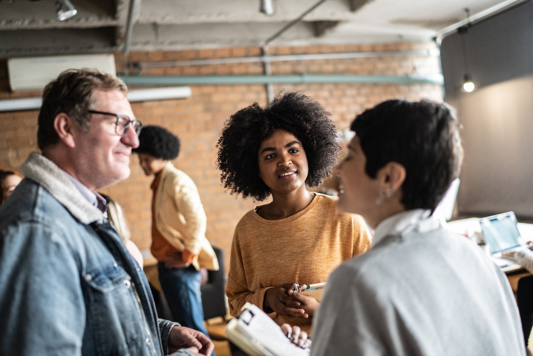 Students or business people talking in the classroom or networking event